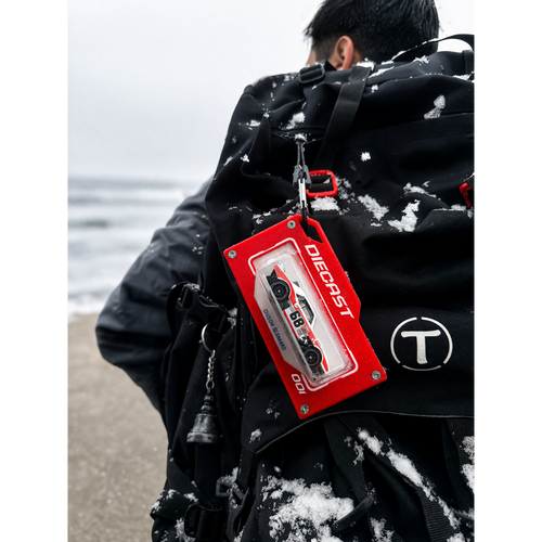 diecast red bag tag in snow